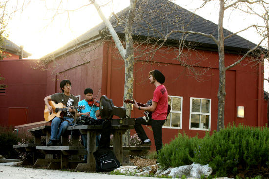 Students playing music in the plaza